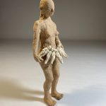 Olga Diego "Figurilla collar de hombres"