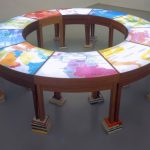 Antoni Muntadas. On Translation: la mesa de negociación II, 2005 Mesa de 10 módulos en madera, cajas de luz y libros